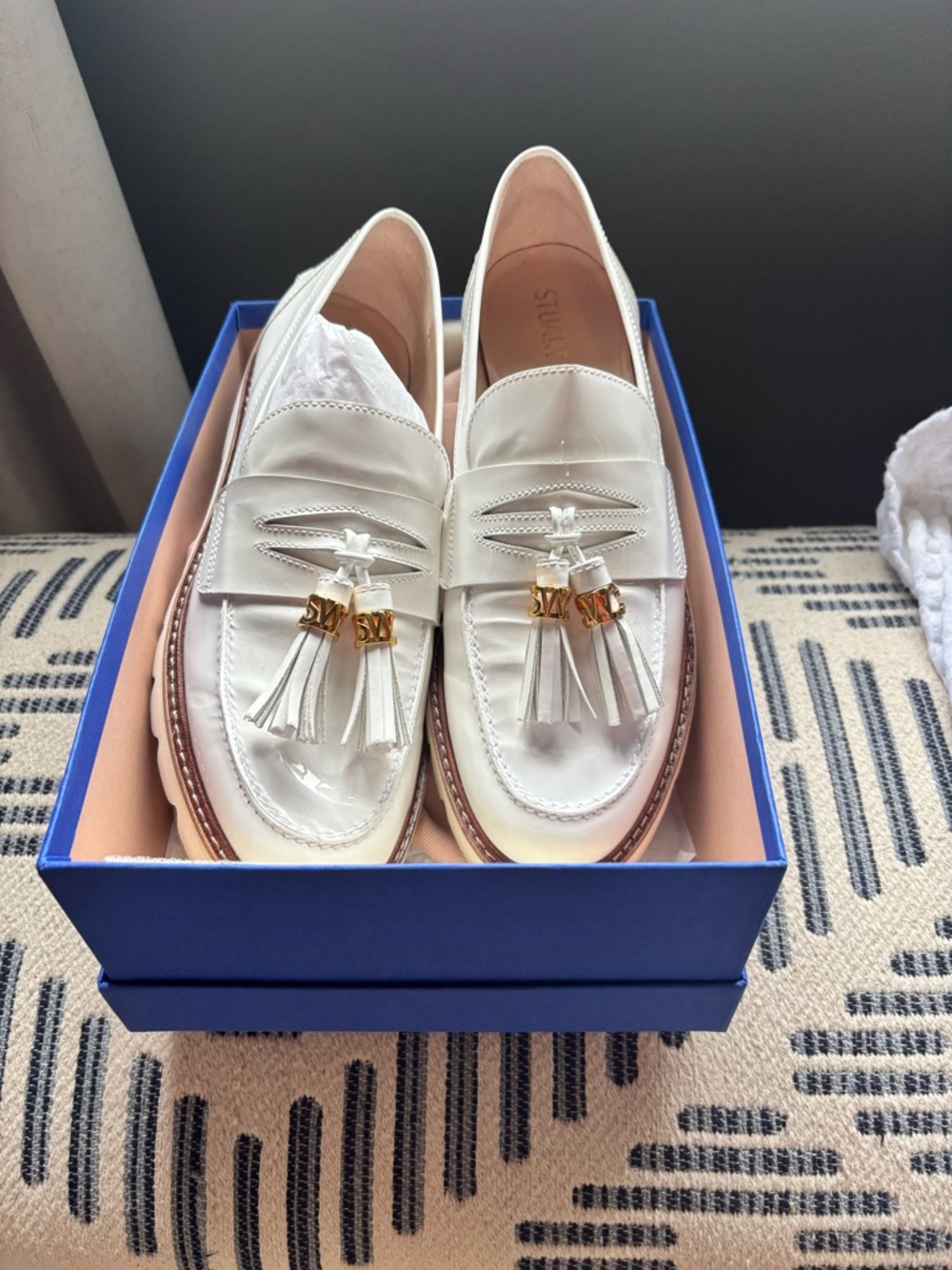 Stuart Weitzman White Tassel Leather Loafers with Gold Accents